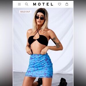 Motel rocks sold out online- Kinnie Mini Skirt In Mesh Butterfly Azure.